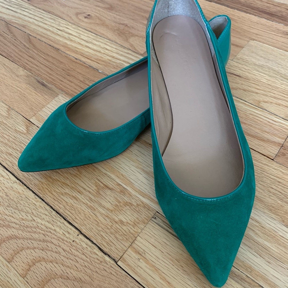 Green pointy flats